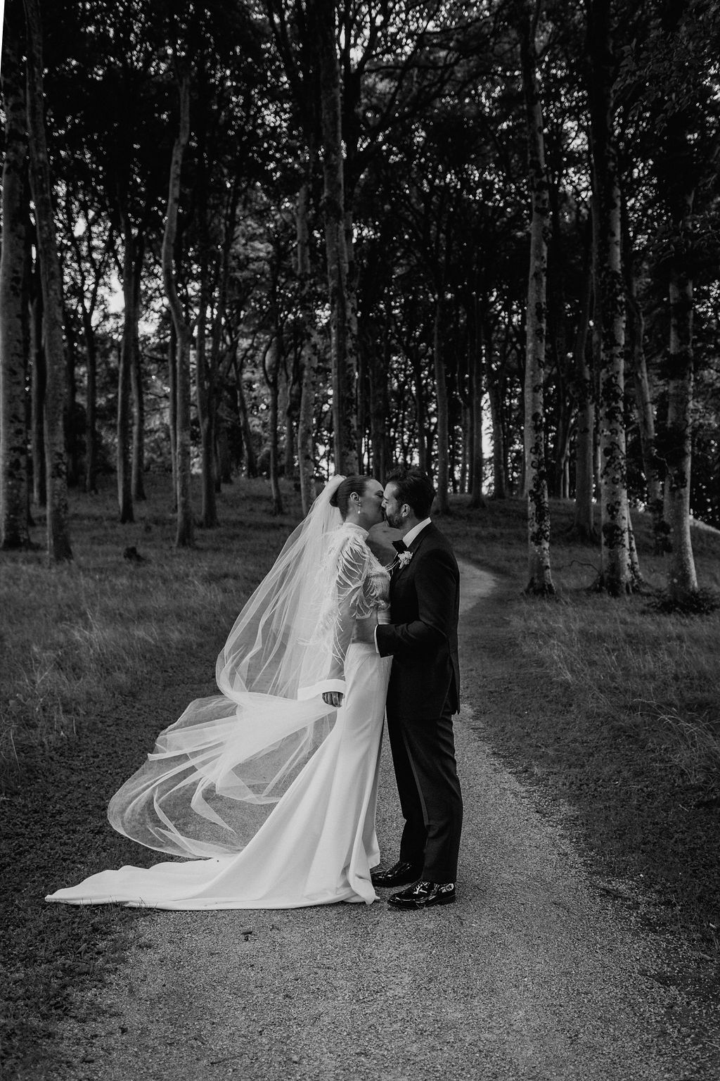 Embrace the romance of a real wedding, adorned in the luxurious, intricate design of a Vinka Design Wedding gown, crafted exquisitely with care.