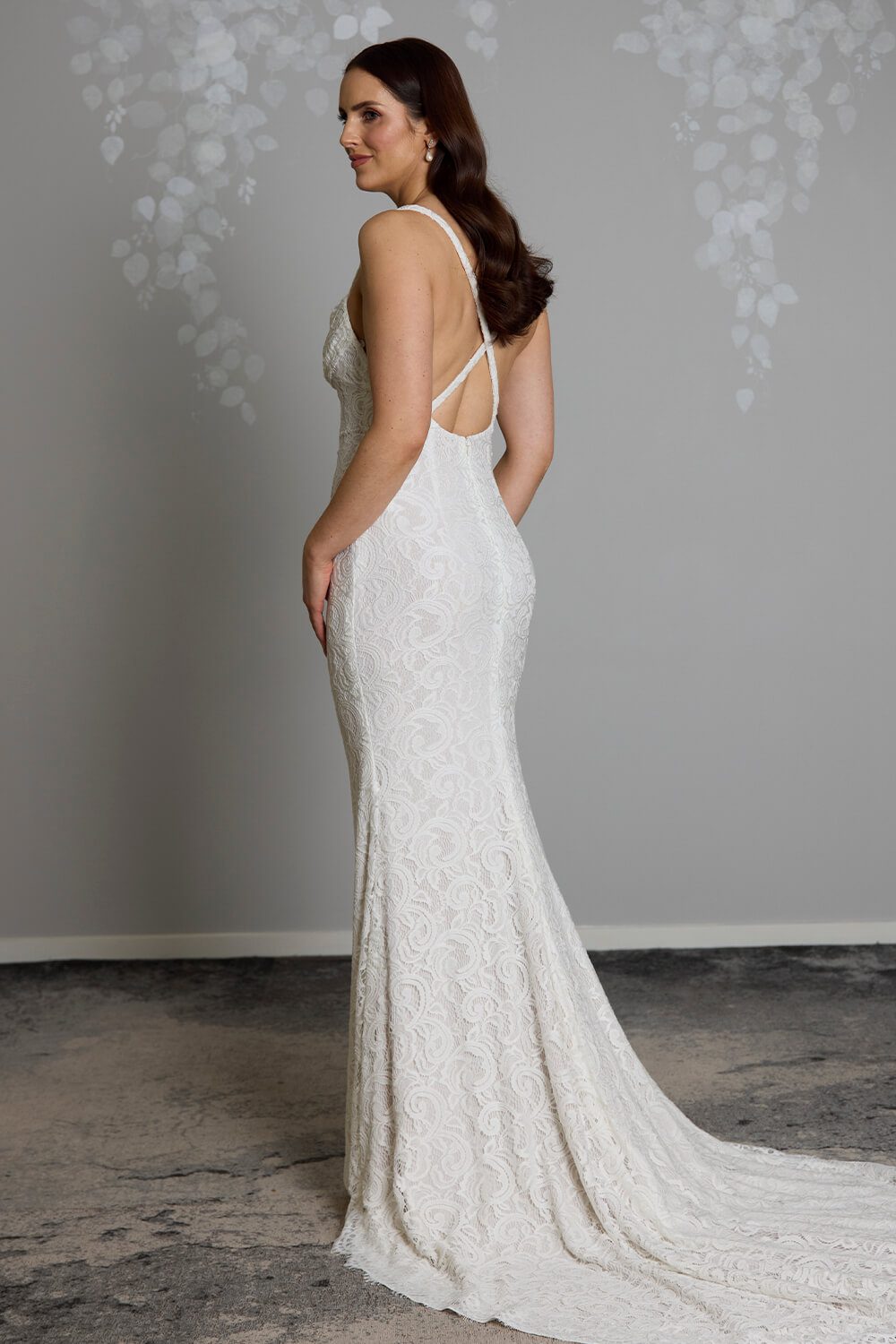 Cove stretch lace wedding dress with cowl neckline, low cross-strap back and light nude power stretch base