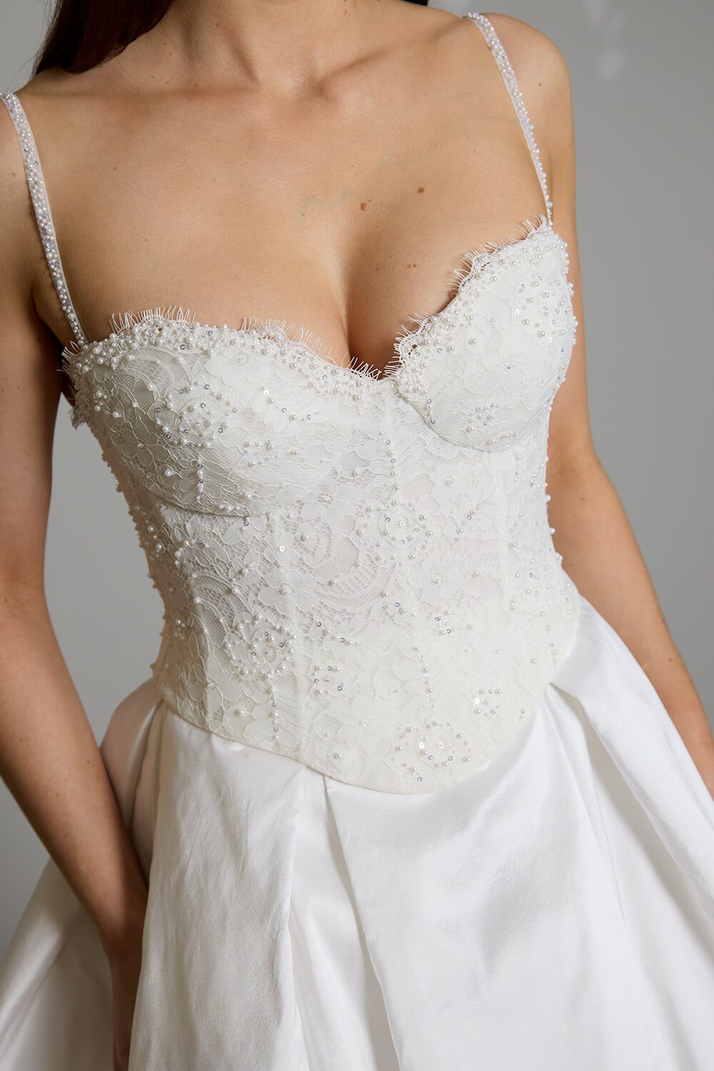 Giselle two-piece wedding dress with semi-sheer beaded lace corset bodice, delicate beaded straps and full silk Dupion skirt