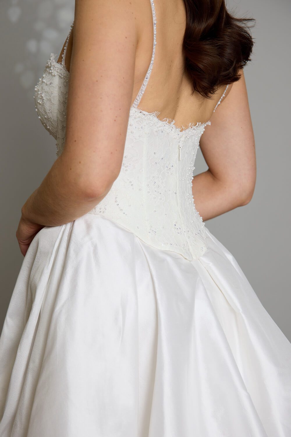 Giselle two-piece wedding dress with semi-sheer beaded lace corset bodice, delicate beaded straps and full silk Dupion skirt
