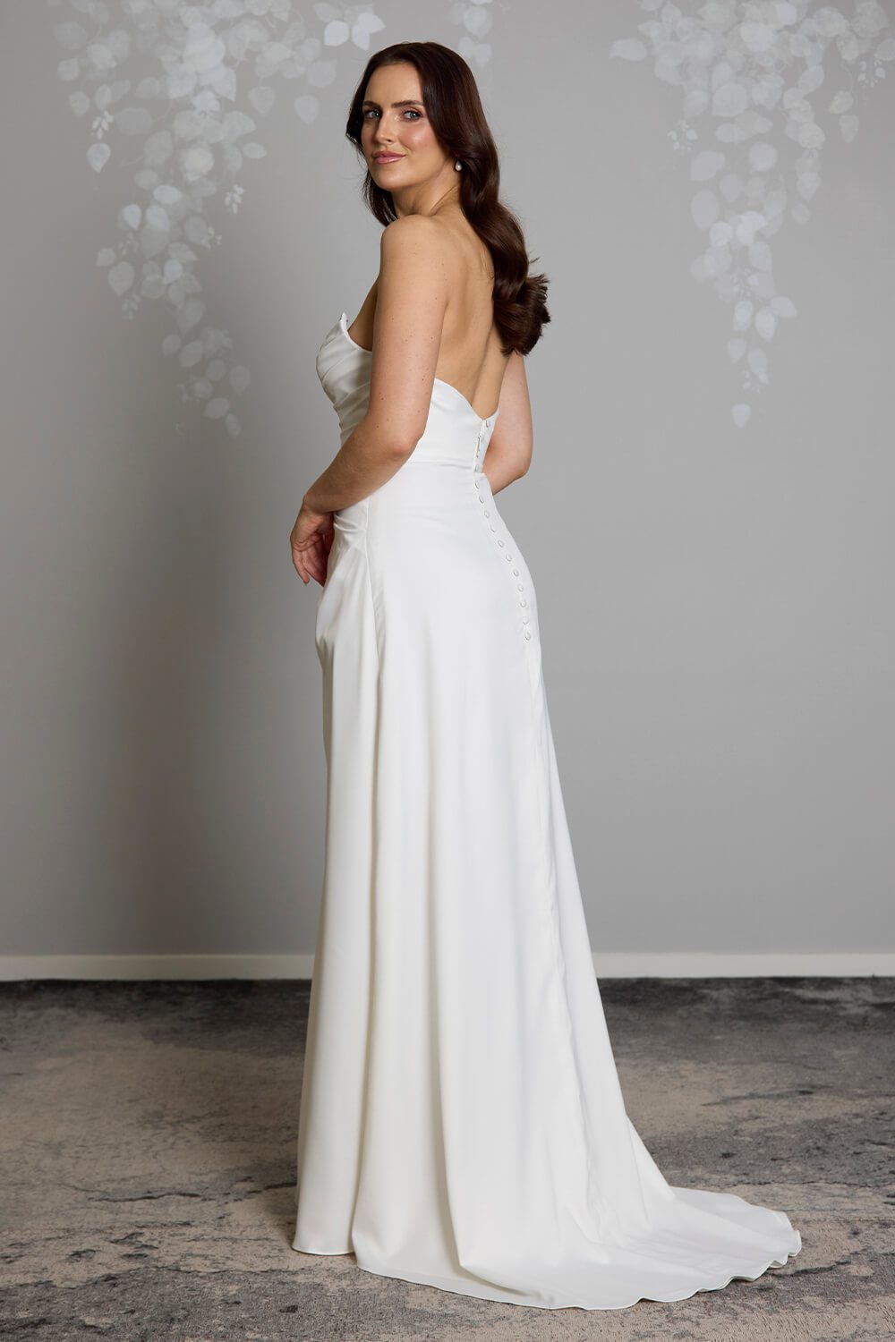Taryn Toscano soft satin wedding gown with strapless draped bodice, gentle V neckline and detachable straps