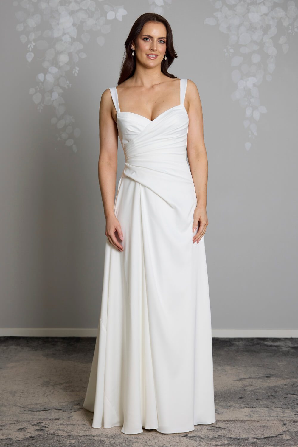 Taryn Toscano soft satin wedding gown with strapless draped bodice, gentle V neckline and detachable straps
