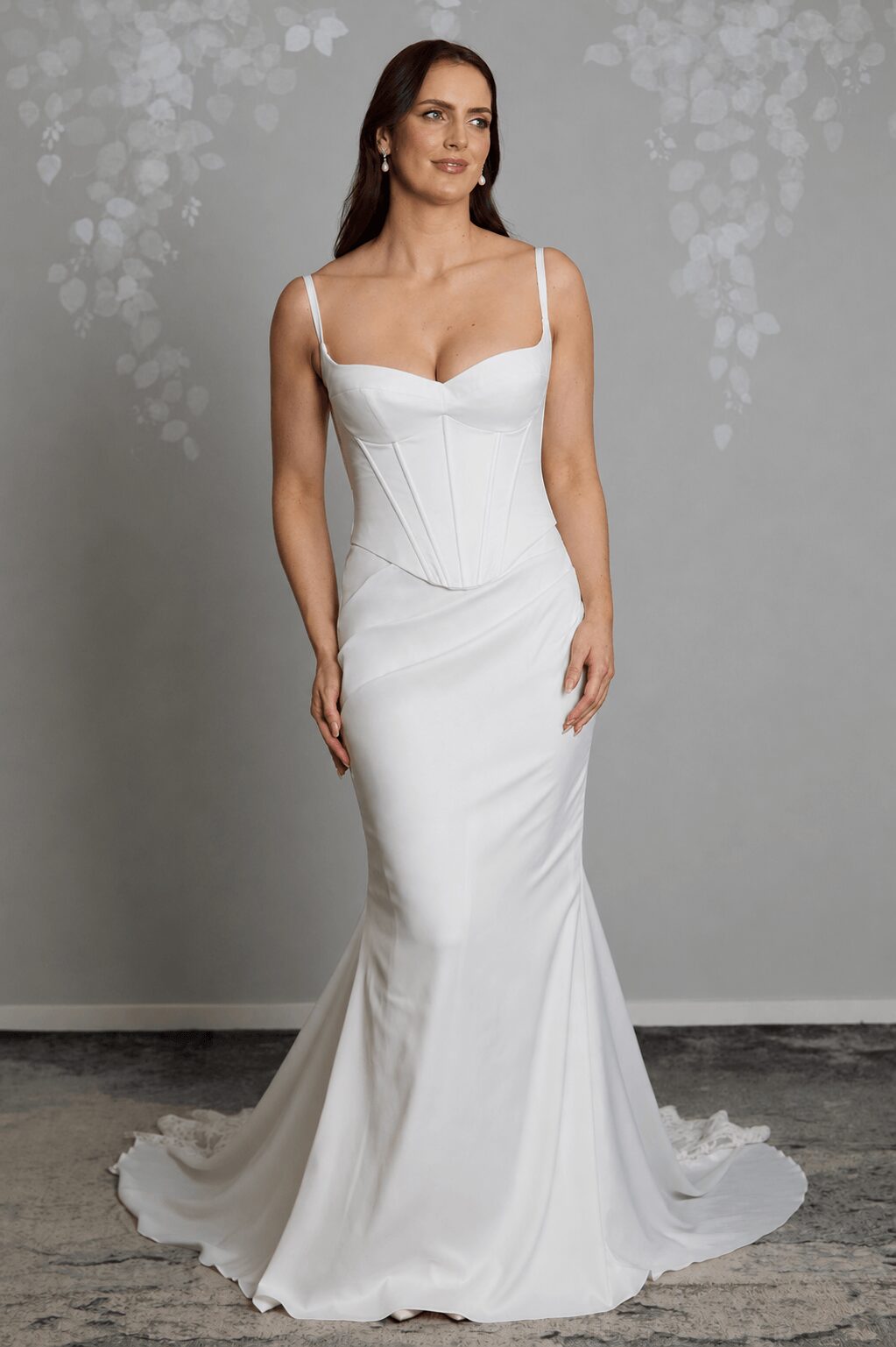 Odette two-piece satin wedding dress with structured corset bodice, lace back detailing, fit-and-flare skirt and lace train insert